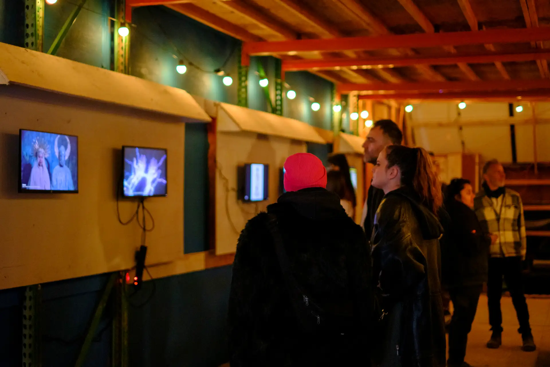 Martians viewing AI video work on the gallery wall · 2026